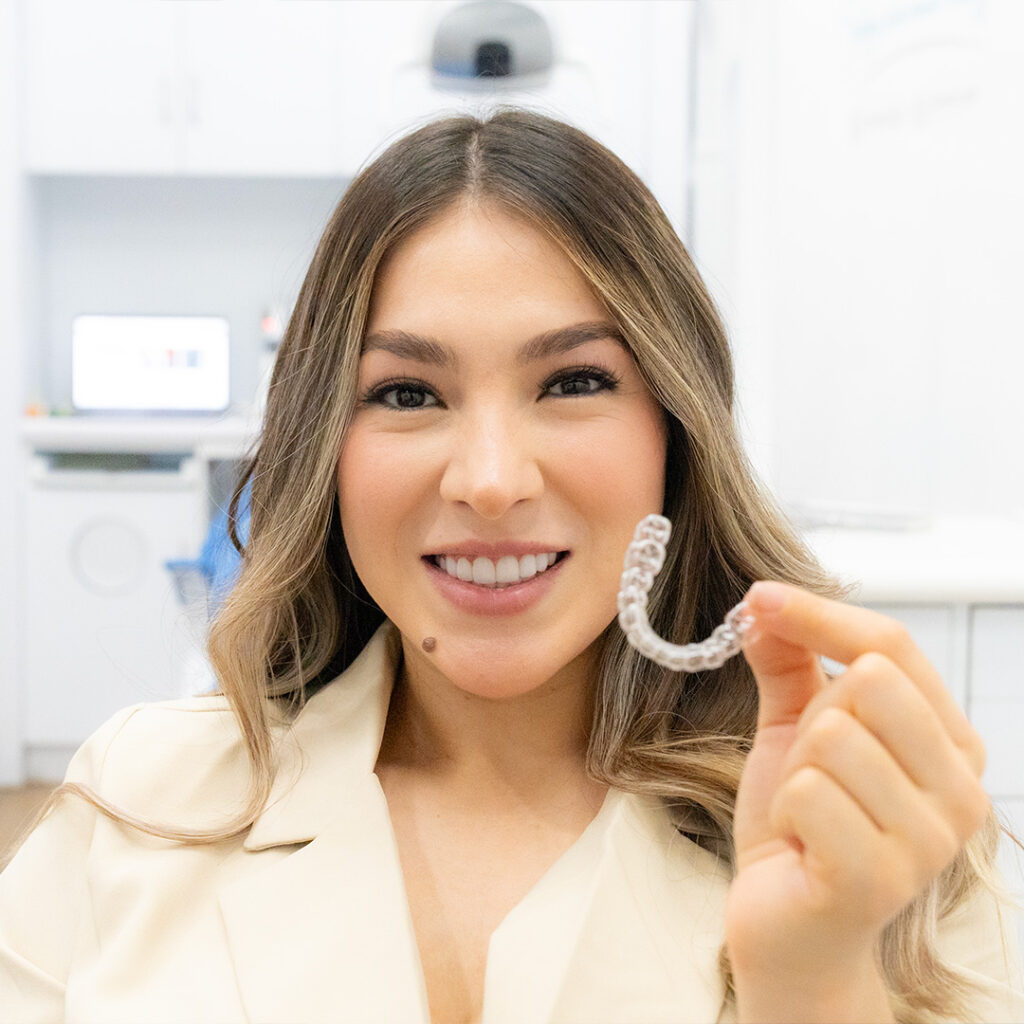 woman with invisalign