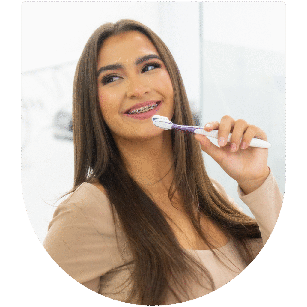 woman brushing teeth