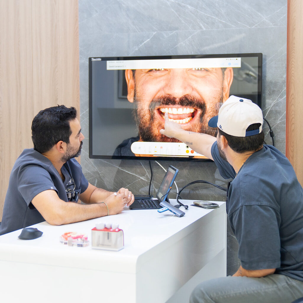 dentist and patient viewing digital smile